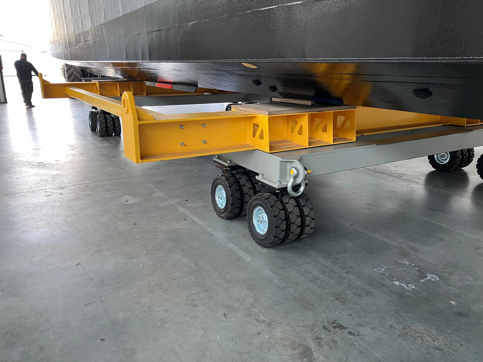 Close-up of heavy-duty wheeled transport cradle